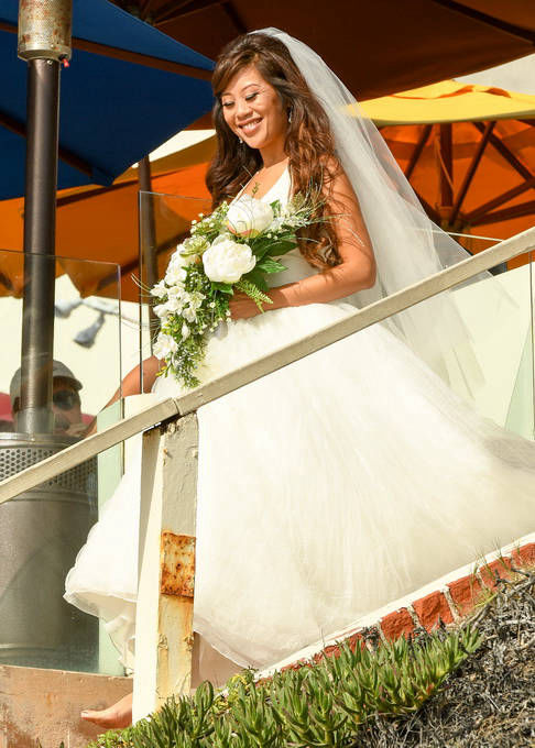 Here comes the bride walking down stairs