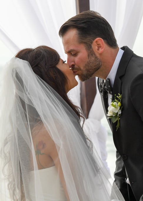 Kiss the bride at wedding ceremony