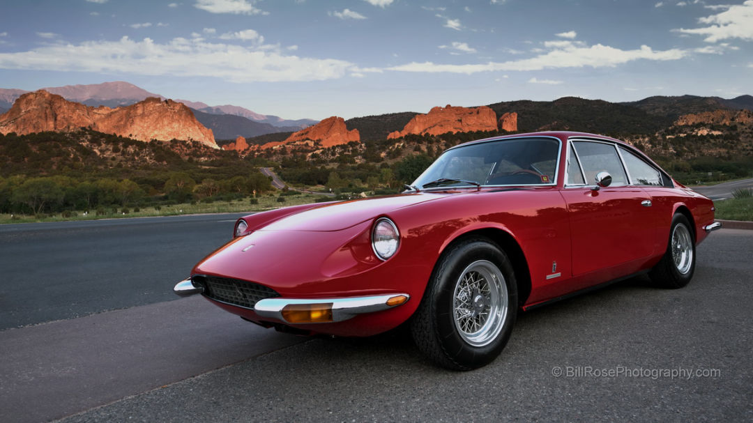 Red Ferrari at sunrise over Garden of the Gods